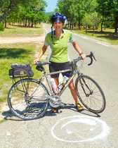 Sally and a smile face - a small reward for a 9km hill climb