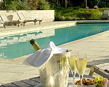 Treat yourself with wine poolside.